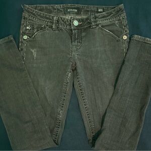 MEK Black Low Rise Denim Oaxaca cigarette cut jeans.